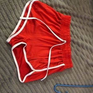 Medium high rise cloth red shorts.